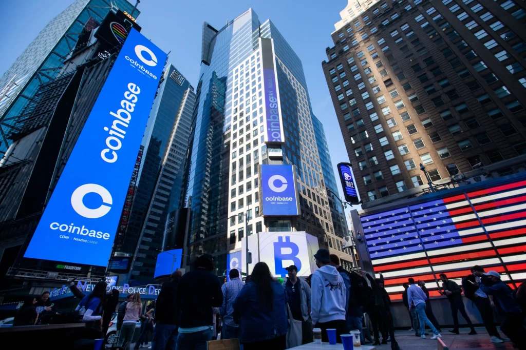 Image about high-rise buildings have billboards coinbase, bitcoin and a lot of people around looking at them