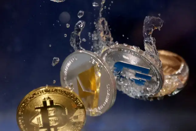 Image about cryptocurrencies falling in water